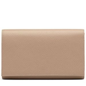 Cuyana pebbled pink leather travel wallet.